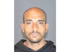 Policía: Se encontró a un hombre de Florida, buscado bajo una orden de arresto, durmiendo en un vehículo robado en Flanders